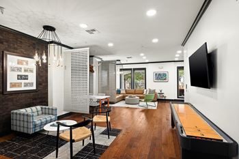 24-Hour social lounge with billiards and shuffleboard